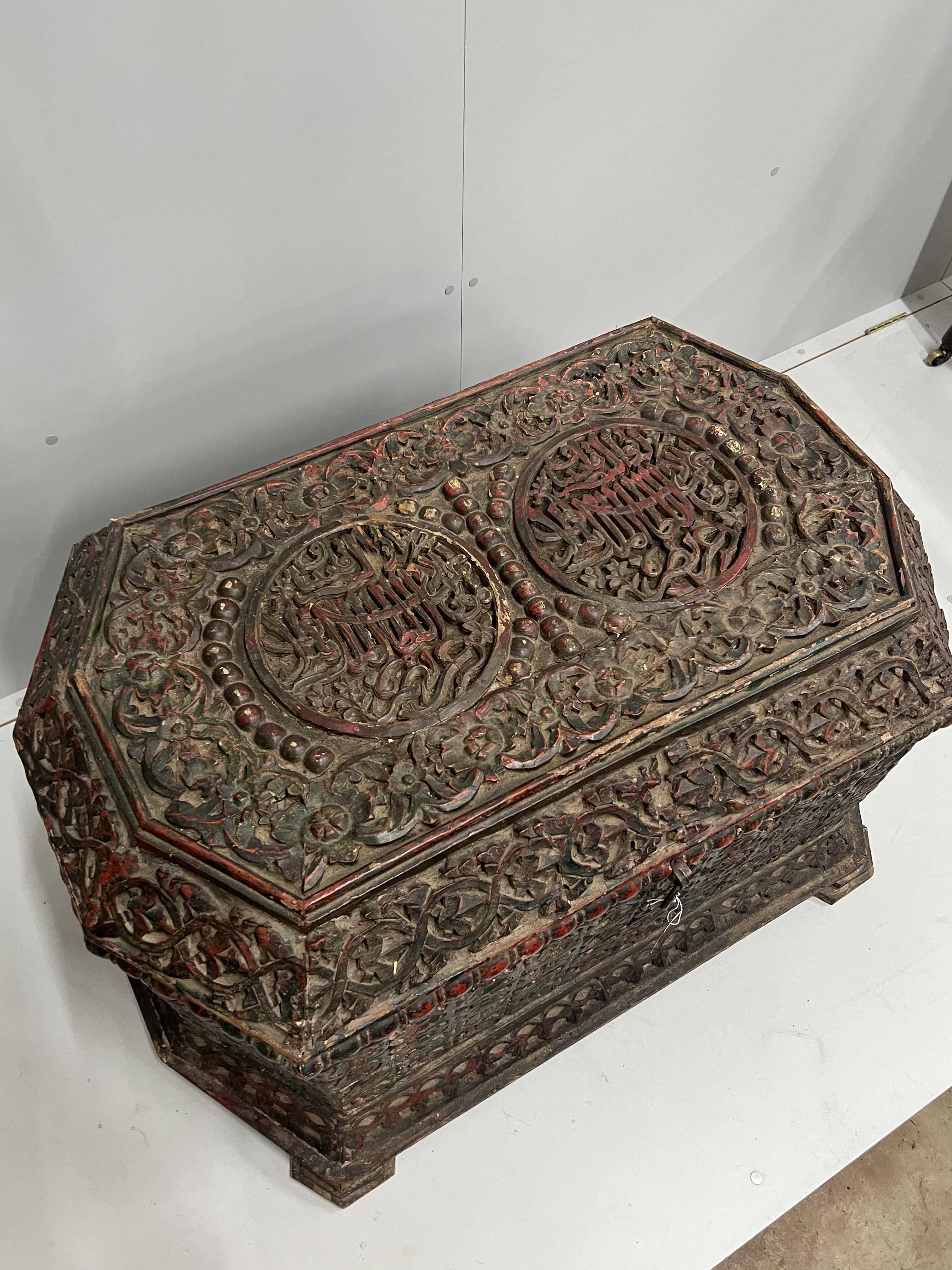 An Islamic octagonal carved wood trunk, width 116cm, depth 64cm, height 64cm, the cover carved “Abu Al-Nasr Qaitbay” (Glory Be to Our Master the Sultan)